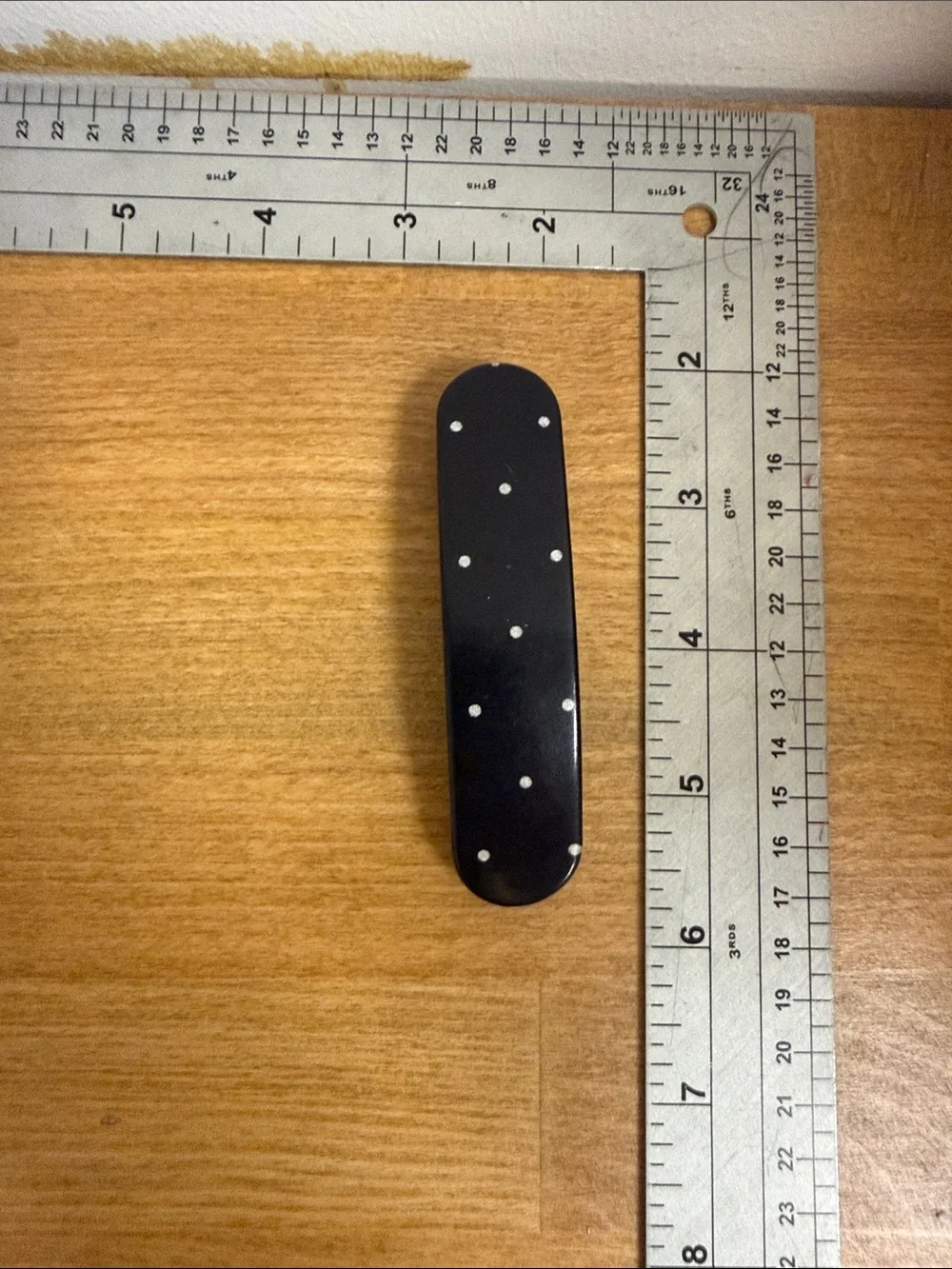 J Crew black plastic barrette clip with white polka dots spots